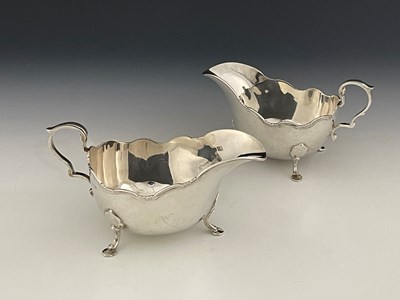 Lot 344 - A pair of Elizabeth II silver sauceboats, each...