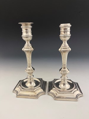 Lot 350 - A pair of George VI silver candlesticks,...