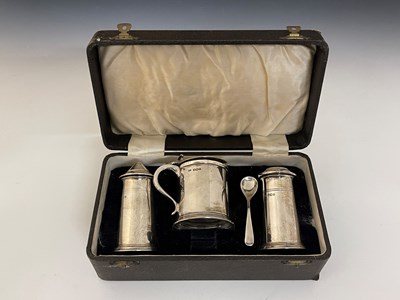 Lot 89 - A cased George VI silver three-piece condiment...