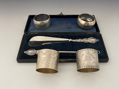 Lot 130 - Two Victorian silver Aesthetic style napkin...