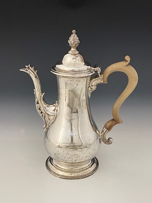 Lot 131 - A George III silver coffee pot, of baluster...