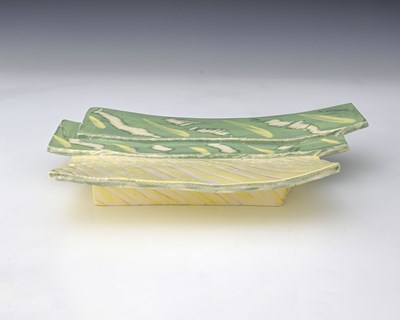 Lot 556 - Carol McNicoll, a studio pottery slab dish,...