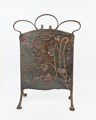 Lot 103 - An Art Nouveau wrought iron and copper fire...