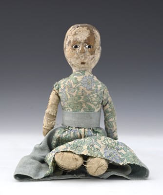 Lot 140 - An 18th century wooden doll, the carved head...