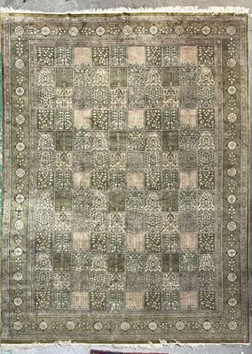 Lot 136 - A room-size Persian Qum (Qom) silk carpet,...