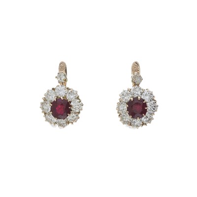 Lot 32 - A pair of gold unheated ruby and diamond cluster earrings