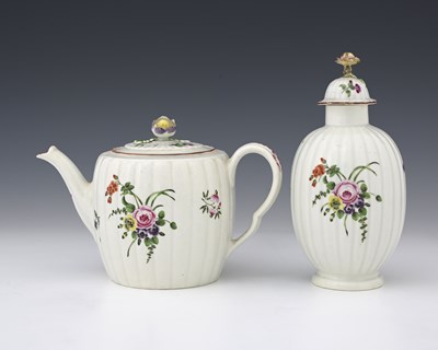 Lot 583 - A Worcester polychrome reeded teapot and a tea...