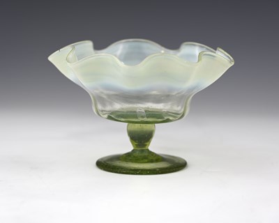 Lot 383 - An Arts and Crafts straw opal glass pedestal...