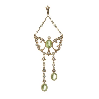 Lot 5 - An Edwardian gold peridot  and pearl openwork pendant