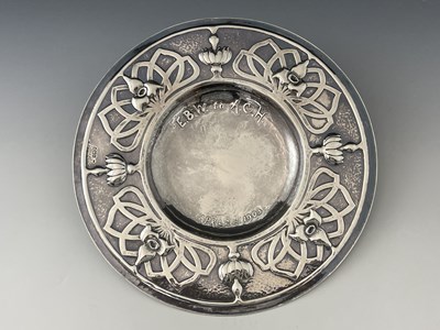 Lot 134 - An Arts and Crafts silver broad rimmed dish,...