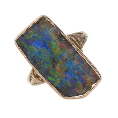 Lot 29 - An early 20th century black opal ring, with 22ct gold replacement band