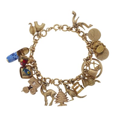 Lot 121 - A mid 20th century 18ct gold charm bracelet