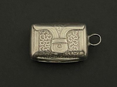 Lot 44 - A George III novelty silver satchel-form...