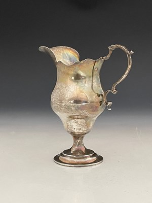 Lot 329 - An Edwardian silver cream or milk jug,...