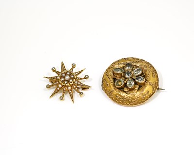 Lot 20 - A Victorian 15ct gold star brooch, set with...