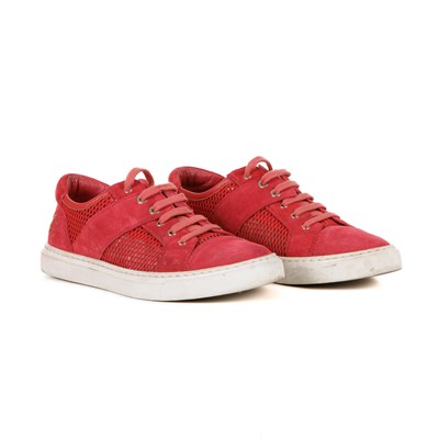 Lot 333 - Chanel, a pair of red CC sneakers