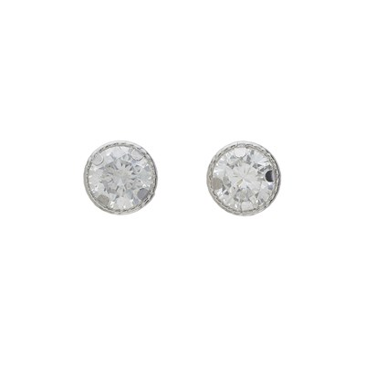 Lot 157 - A pair of 9ct gold diamond single-stone stud earrings