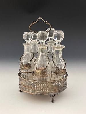 Lot 426 - A nineteenth-century silver five-bottle sauce...