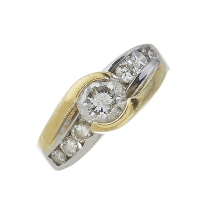 Lot 158 - A 14ct bi-colour gold diamond crossover ring