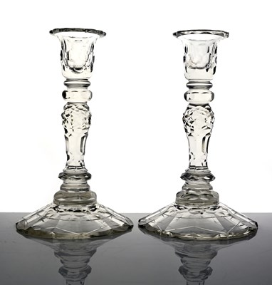 Lot 350 - A pair of facet cut glass candlesticks circa...