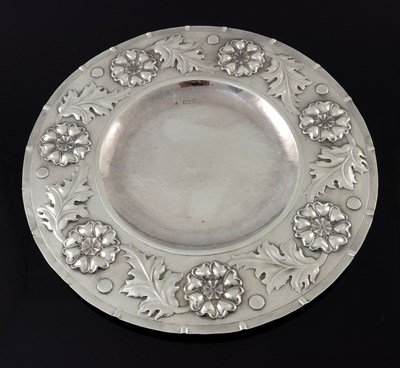 Lot 138 - An Arts and Crafts silver broad rimmed dish,...