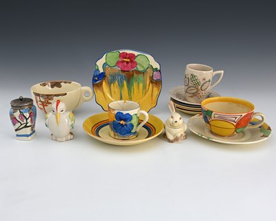 Lot 523 - Clarice Cliff, a collection of Wilkinson and...