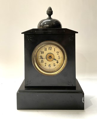 Lot 355 - A 19th-century slate mantle clock topped with...