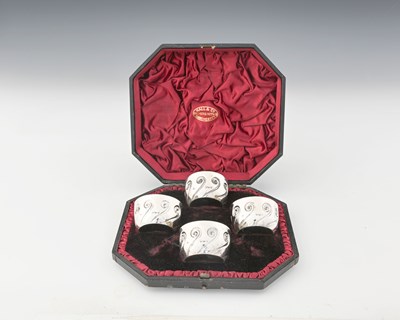 Lot 406 - A cased set of four Victorian silver salts,...