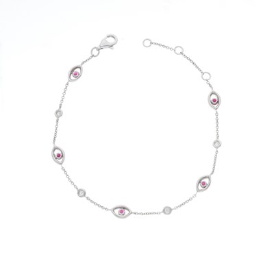 Lot 98 - An 18ct gold ruby and diamond line bracelet