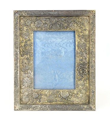 Lot 322 - A Japanese silver plated embossed photograph...