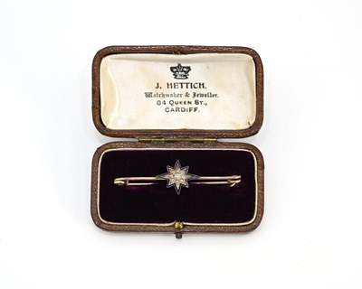 Lot 31 - A Victorian gold, diamond and enamel bar...