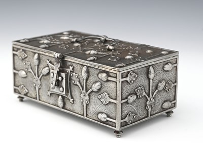 Lot 83 - An Arts and Crafts Gothic Revival steel casket,...