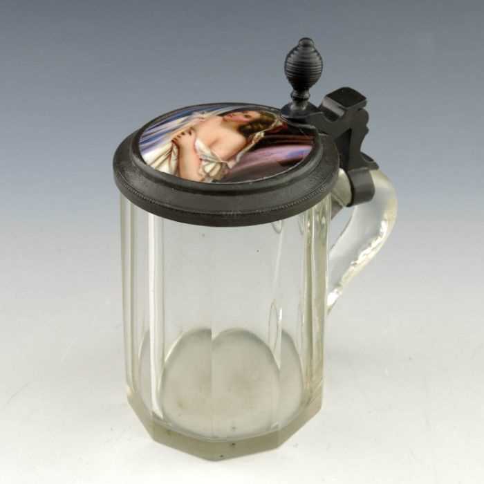Lot 401 - A 19th century pewter and glass stein, hinged...