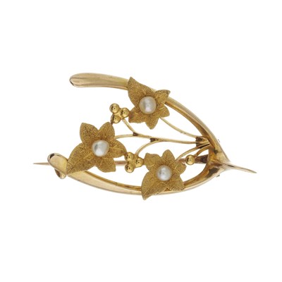 Lot 72 - A gold seed pearl wishbone brooch