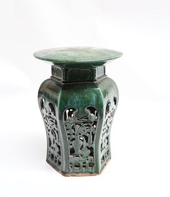 Lot 312 - A Chinese green glazed reticulated garden seat,...