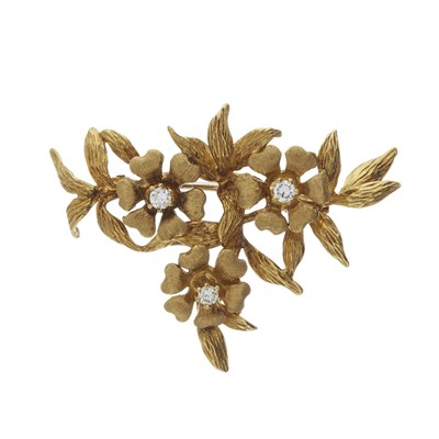 Lot 91 - Cropp & Farr, a 1970s 18ct gold diamond flower brooch