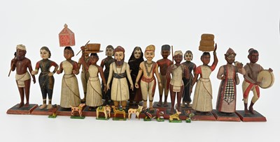 Lot 442 - A group of Indian wooden figures, late 19th...