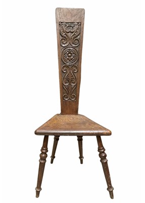 Lot 933 - A Welsh oak spinning chair with carved relief...