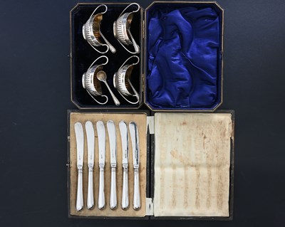 Lot 254 - A set of four Victorian silver cased salt...