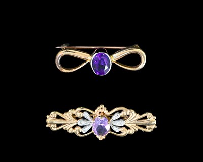 Lot 6 - Two gold amethyst brooches