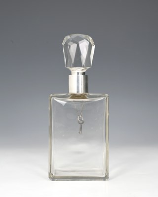 Lot 259 - A George V silver-mounted glass decanter, the...