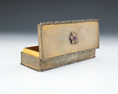 Lot 396 - A George V silver-gilt box, of slender...