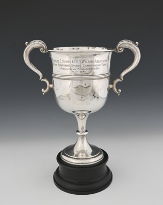 Lot 359 - A George V silver two-handle trophy cup, with...