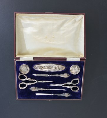 Lot 299 - A cased Art Nouveau manicure set, to include a...