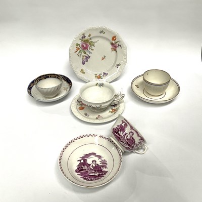 Lot 212 - An assortment of porcelain cups and saucers,...