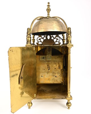 Lot 245 - A traditional brass lantern clock, 19th...