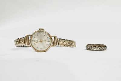 Lot 604 - A 9ct gold watch and a 9ct gold eternity ring