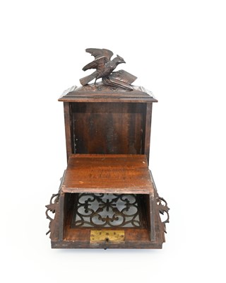 Lot 220 - A Black Forest carved country house letter box,...