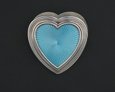 Lot 237 - An Edwardian silver and enamel heart-shaped...