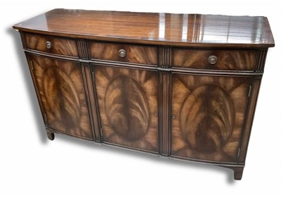 Lot 887 - A large mahogany veneer sideboard, featuring...